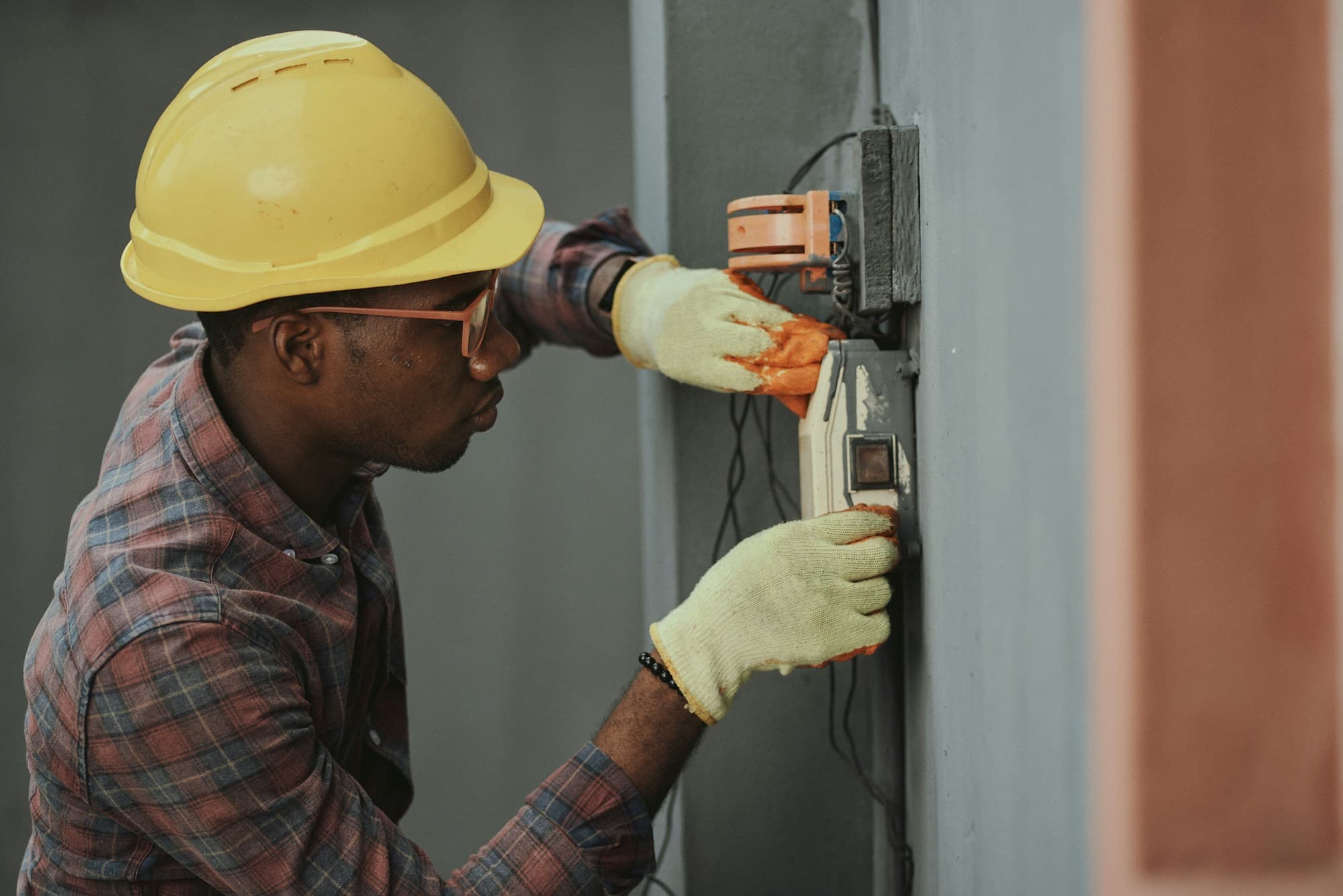 Electrician inspecting an electrical installation